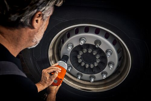 Small STEP RGB Web-Bolting a safety wheel nut with an impact wrench.jpg