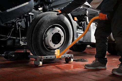 Small STEP RGB Web-Removal of a truck wheel with wheel lifter.jpg